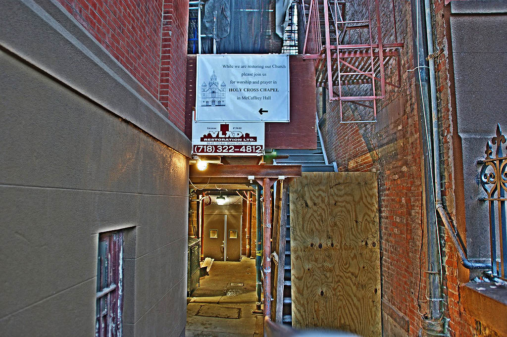 #3. A sign says the church is being renovated and points the way to a makeshift chapel.